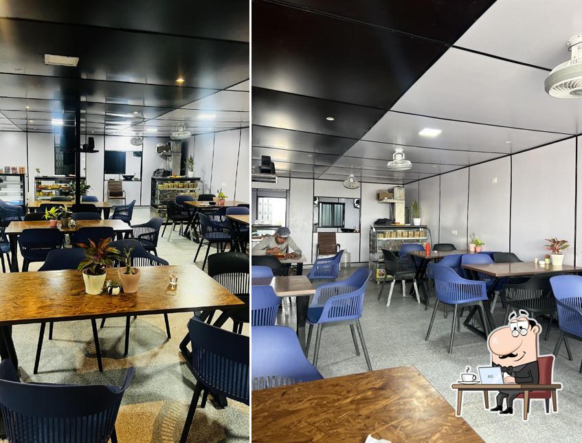 Take a seat at one of the tables at SR FRIENDS CAFE