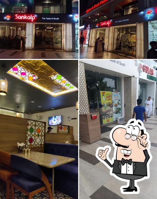 The interior of SANKALP RESTAURANT - SOUTH INDIAN RESTAURANT IN GANDHINAGAR