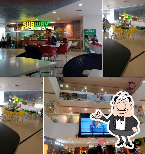 Take a seat at one of the tables at Subway Srikant Verma Road