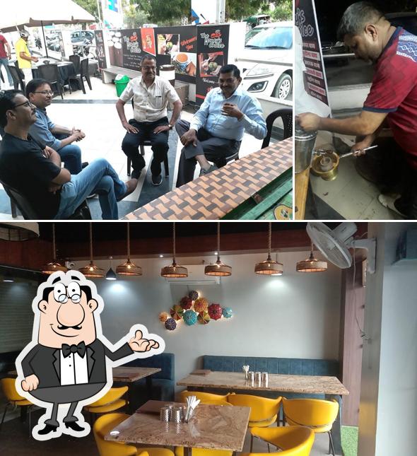 Take a seat at one of the tables at THE HONEY'S CHOICE - Restaurant & Café