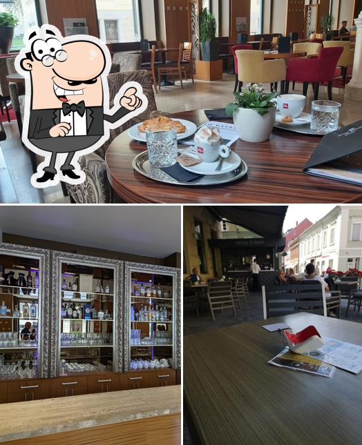 Siediti a un tavolo di Kavarna in slaščičarna Hotel Evropa