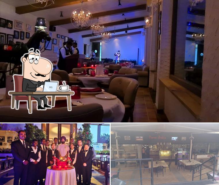 Take a seat at one of the tables at Parsi Dhaba