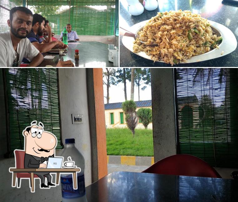 This is the picture showing interior and food at Rajath Family Garden Restaurant