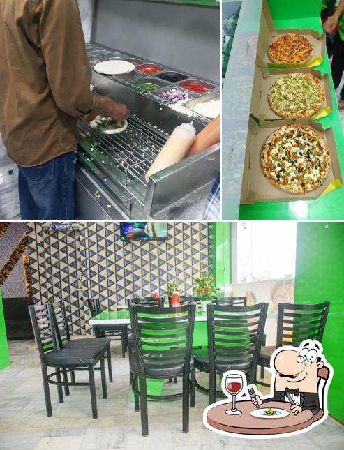 Take a look at the picture displaying food and interior at Skylight Pizza and cafe ghogra