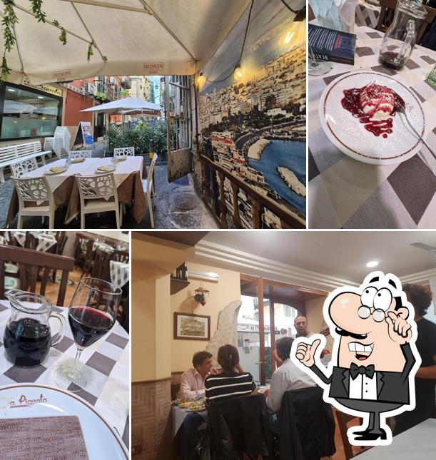 Siediti a un tavolo di Trattoria A Pignata