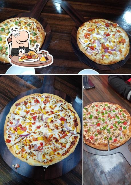 Pick pizza at Pizza Star Ganaur