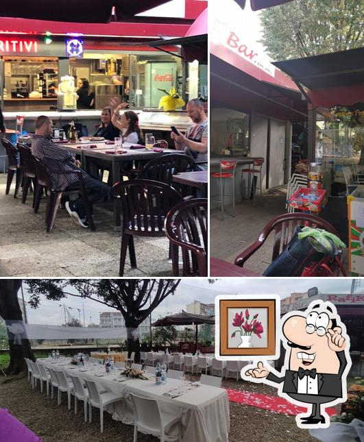 Dai un'occhiata agli interni di Rafiki Bar Pizzeria