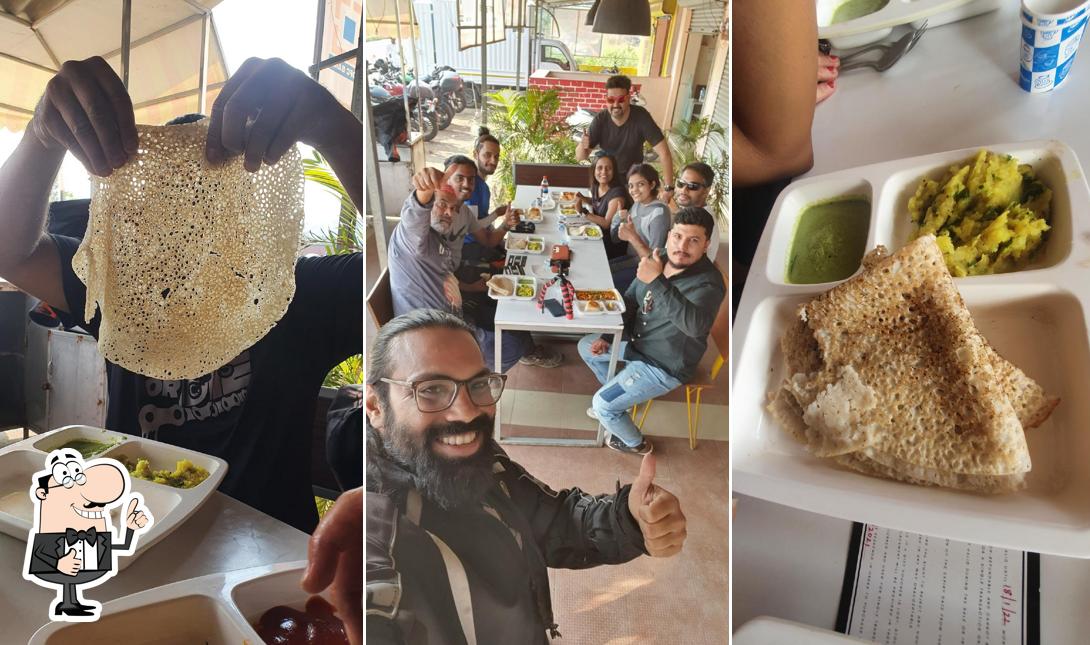 Look at the photo of Cafe ravan