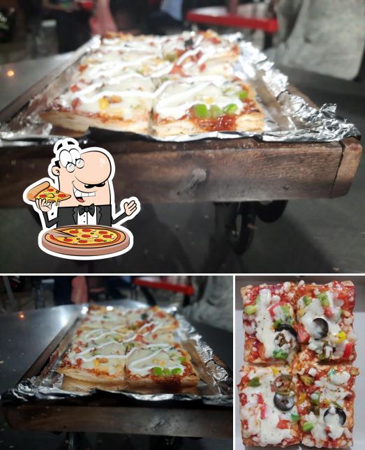 Get pizza at Dharmnandan Live Puff House – Adajan