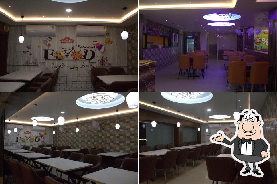 The interior of SPHOORTHY MULTI-CUISINE VEG RESTAURANT