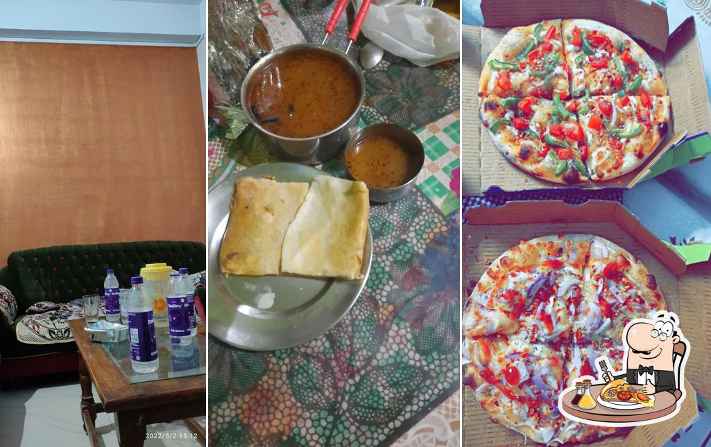 Get pizza at Mrignainy Restaurant