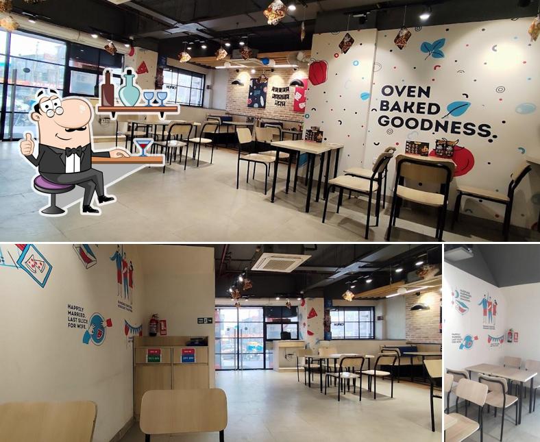 Check out how Domino's Pizza Hotel Royal Star, Sahibzada Ajit Singh Nagar looks inside