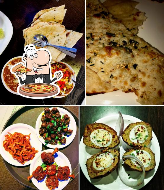 Order pizza at Santusthi A/C Multi cuisine RESTAURANT