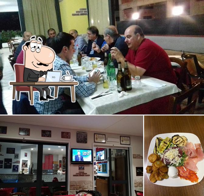 La foto della interni e cibo di Pizzeria Il Portico "da Giuseppe"