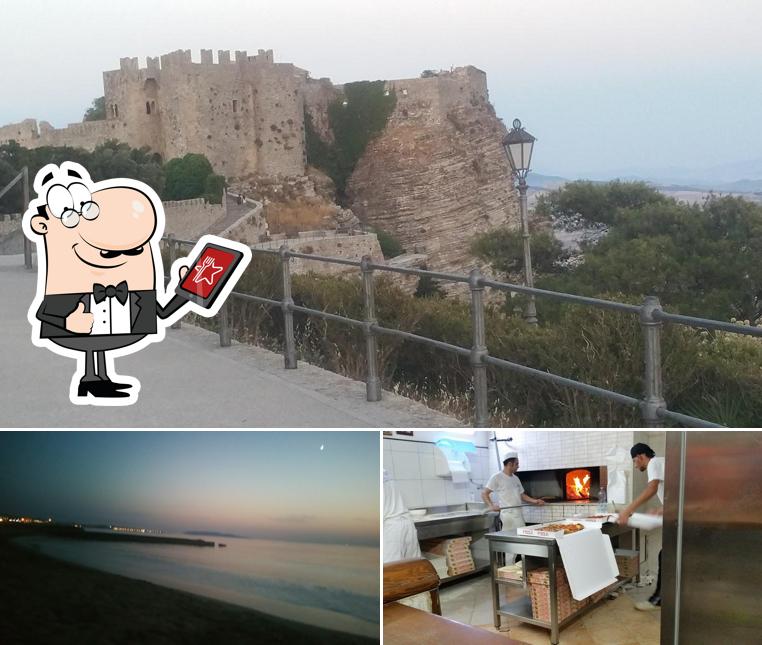 Questa è la foto che presenta la esterno e interni di pizza planet