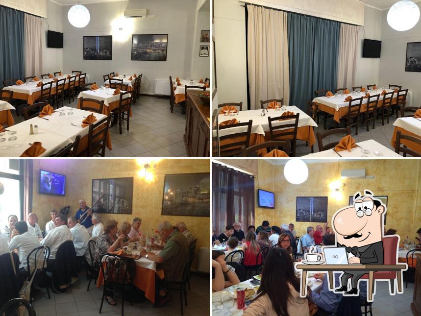 Siediti a un tavolo di Ristorante Pizzeria San Martino