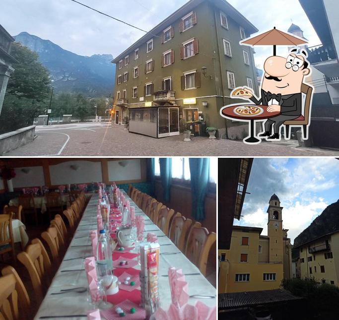 Dai un’occhiata alla foto che mostra la esterno e tavolo da pranzo di Antica Trattoria Bar Alla Stazione