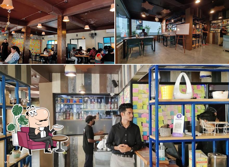 Take a seat at one of the tables at Charcoal Shack Restaurant