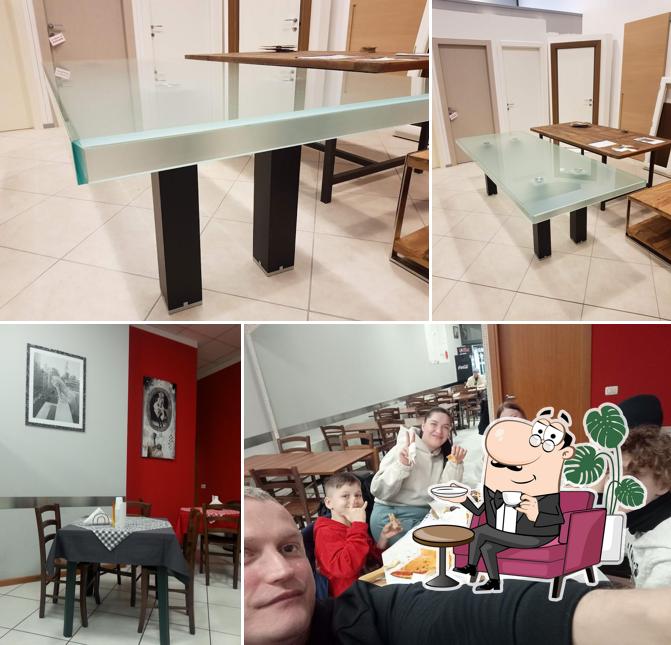 Dai un'occhiata agli interni di PIZZERIA ERIKA