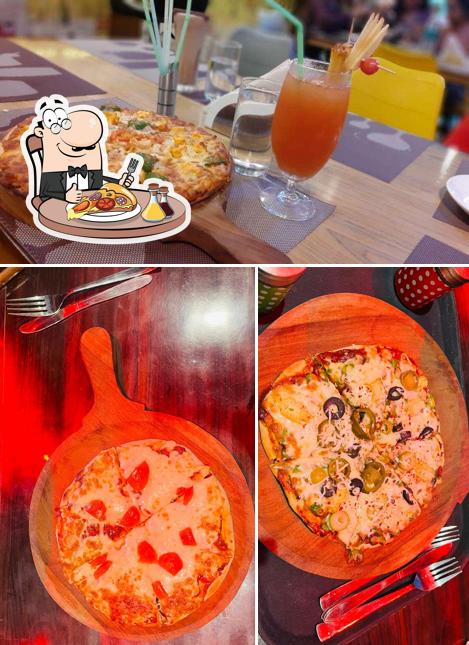 Order pizza at The 7 Ages Cafe And Restro