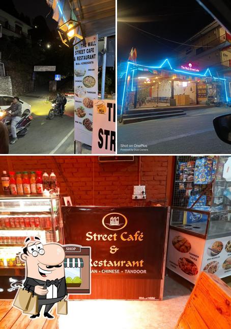 The photo of exterior and interior at The Wall Street Cafe & Restaurant