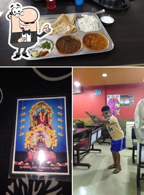 Take a look at the photo displaying interior and food at City Dhaba Resto