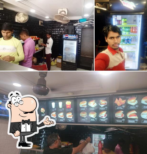 The interior of King Vadapav & Samosa Tithal Road