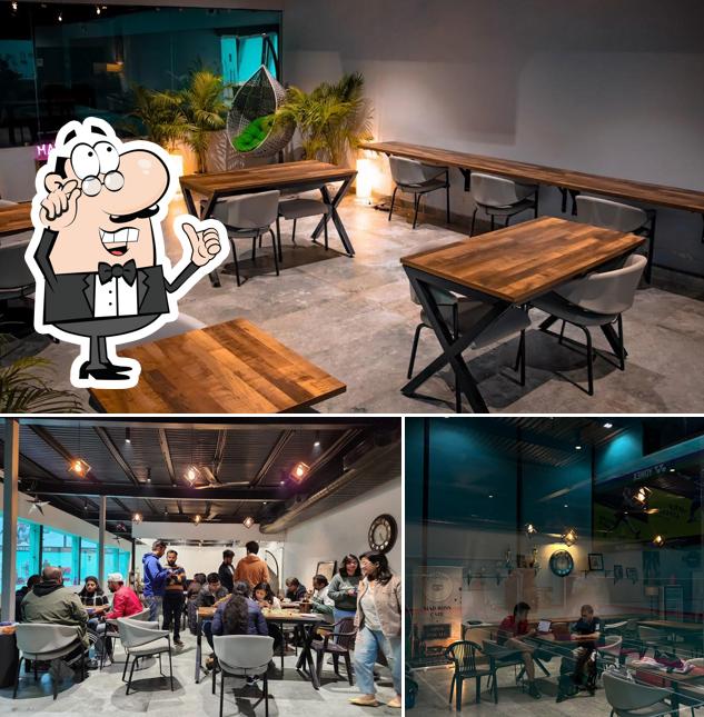 Take a seat at one of the tables at Mad Boss