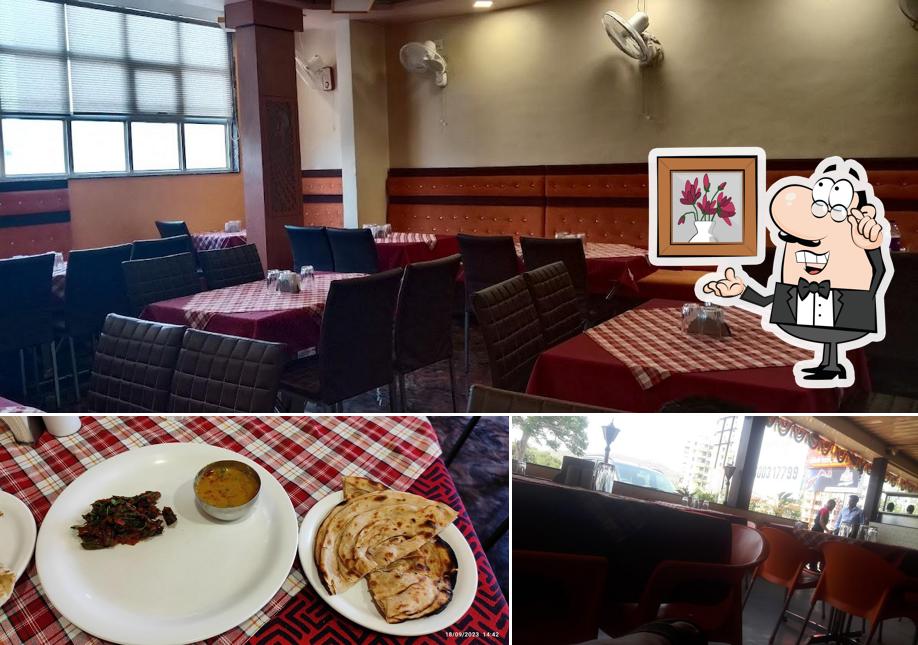 This is the image displaying interior and food at Janvi Restaurant and Lodge