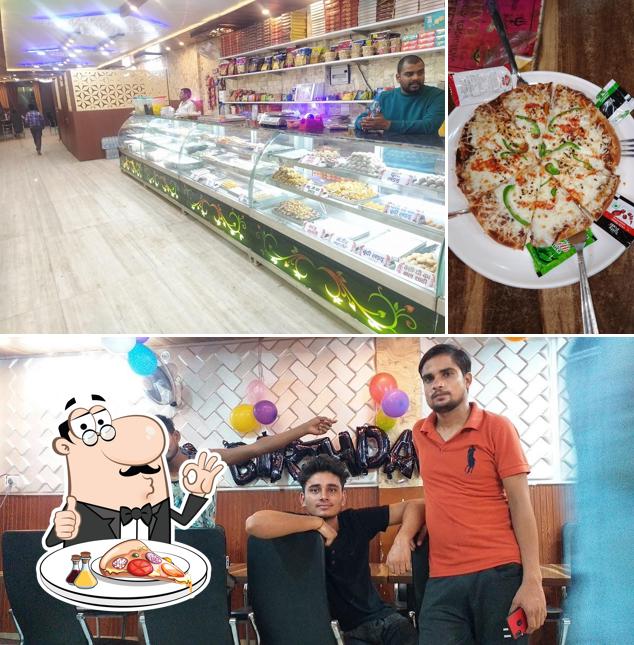 Try out pizza at Shiva Sweets and Family Restaurant