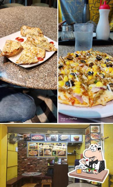 This is the photo showing food and interior at Pizza house