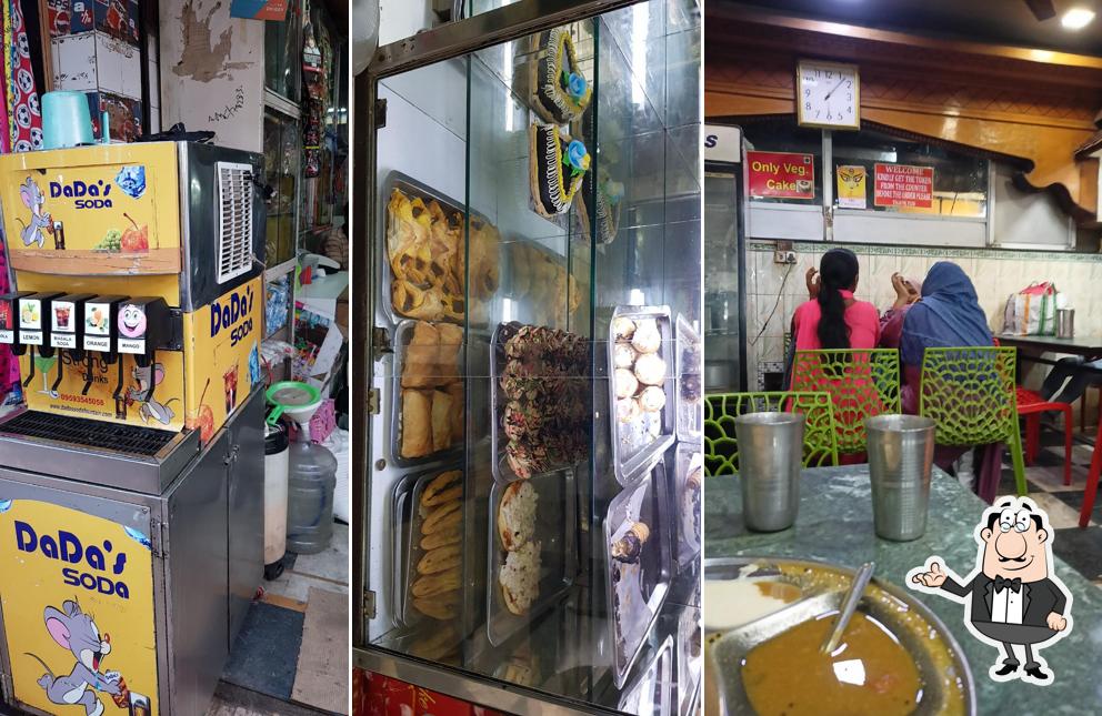 Take a seat at one of the tables at The Magnolia South Indian Restaurant and confectionery