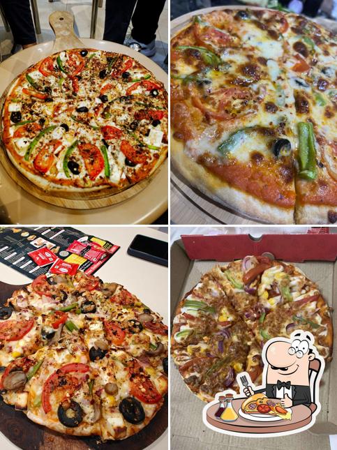 Pick pizza at Elite Crew Cafe