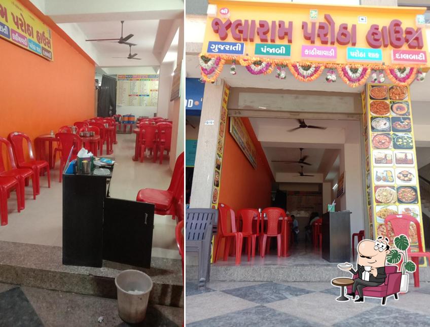 Take a seat at one of the tables at Jalaram Parotha House