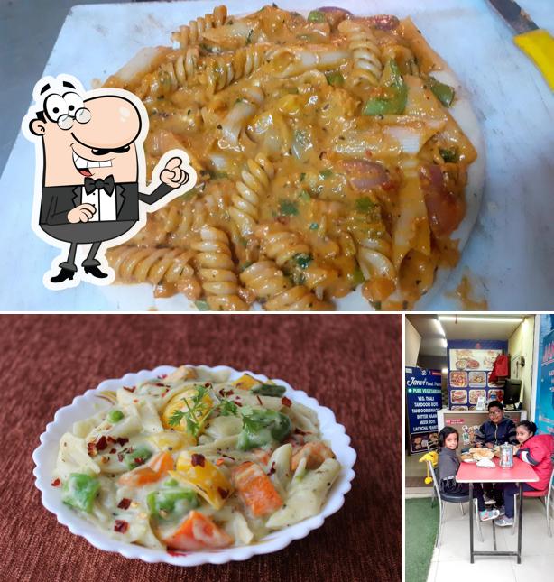 Take a look at the photo displaying interior and food at Janvi Food Point