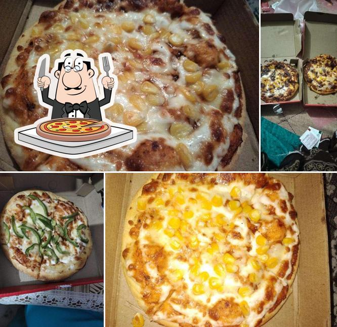 Try out pizza at Al Baik Pizza