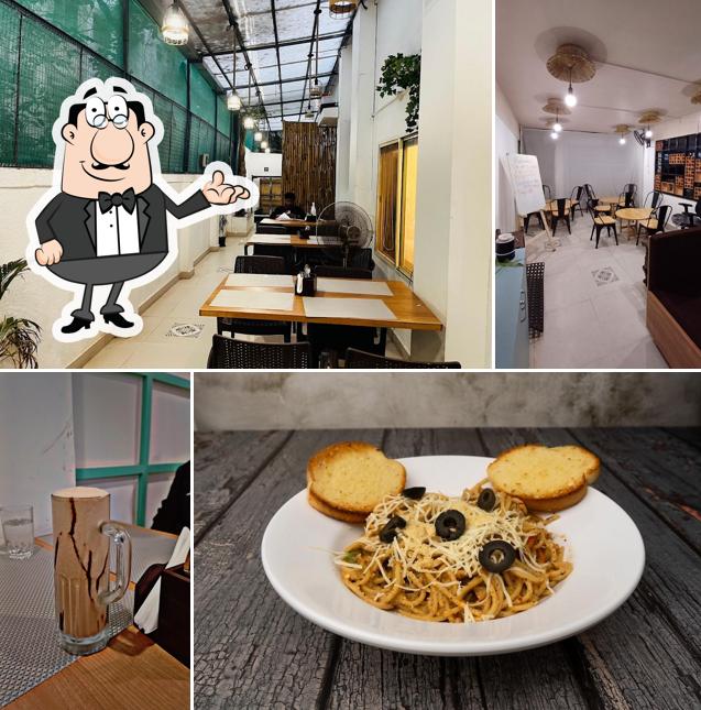Take a seat at one of the tables at Bookavibe - Book Cafe and Co-working space
