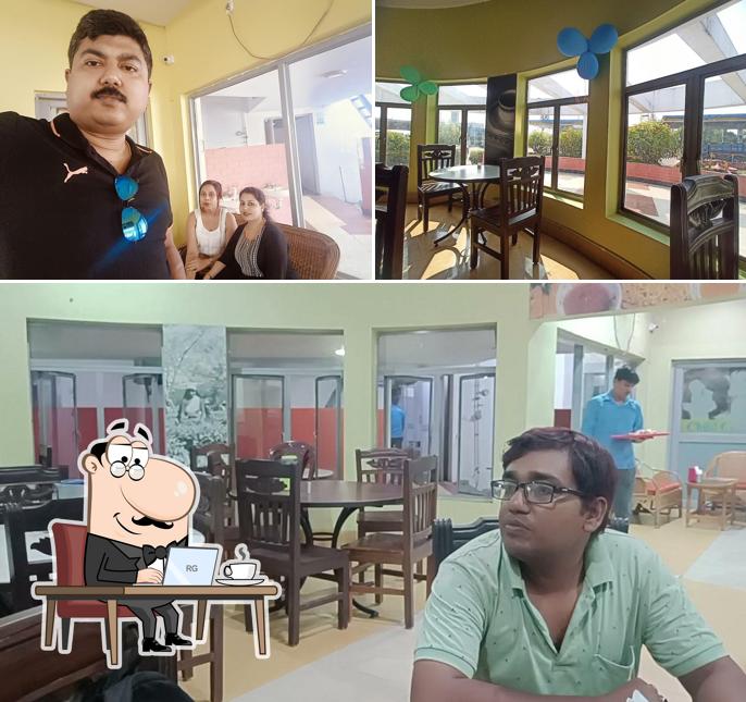 Take a seat at one of the tables at Ghar Dhaba