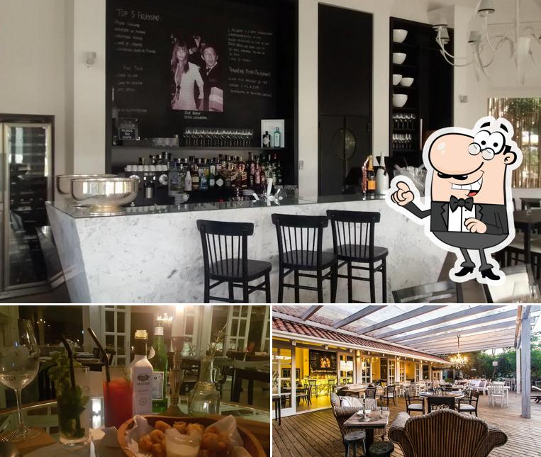 Sente em uma das mesas no Felissimo Bistrô