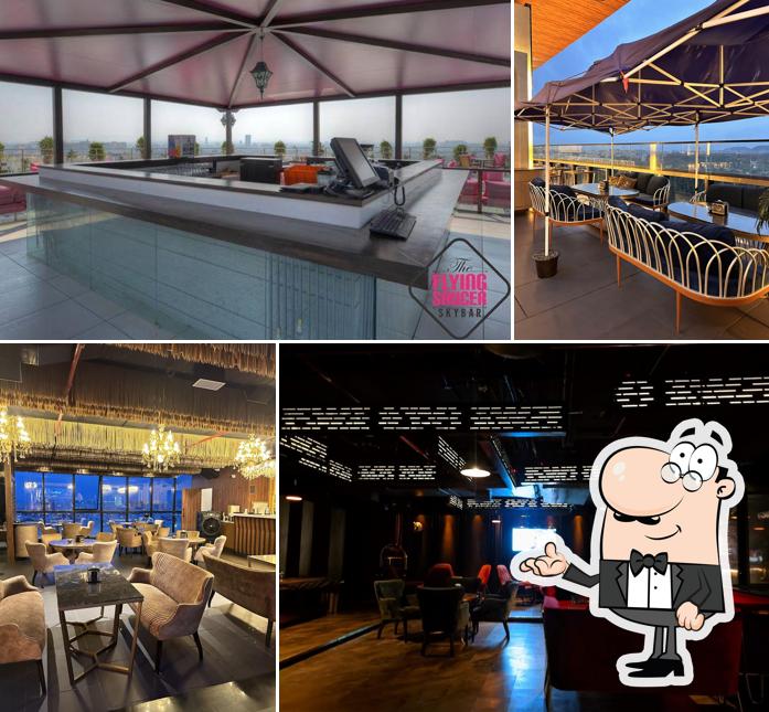 Take a seat at one of the tables at The Mafia Family Kitchen & Bar