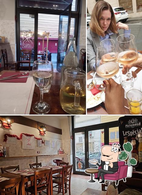 Dai un'occhiata agli interni di Osteria Red
