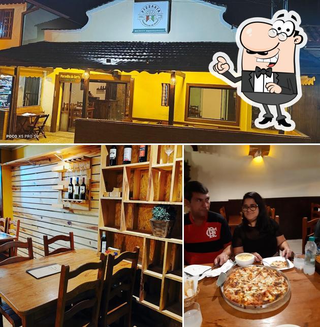O interior do PIZZARIA MARAVILHA DA SERRA