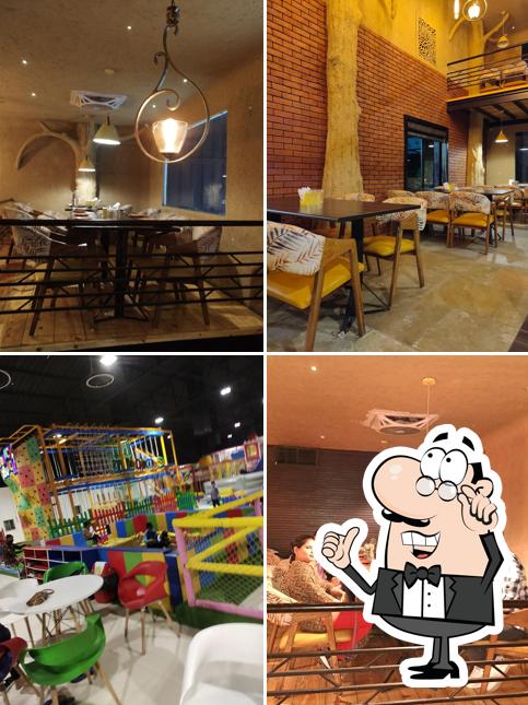 Take a seat at one of the tables at Vrindavan Restaurant