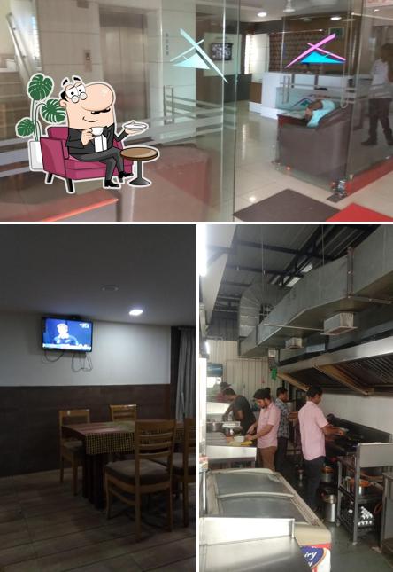 Take a seat at one of the tables at Hotel Food Park