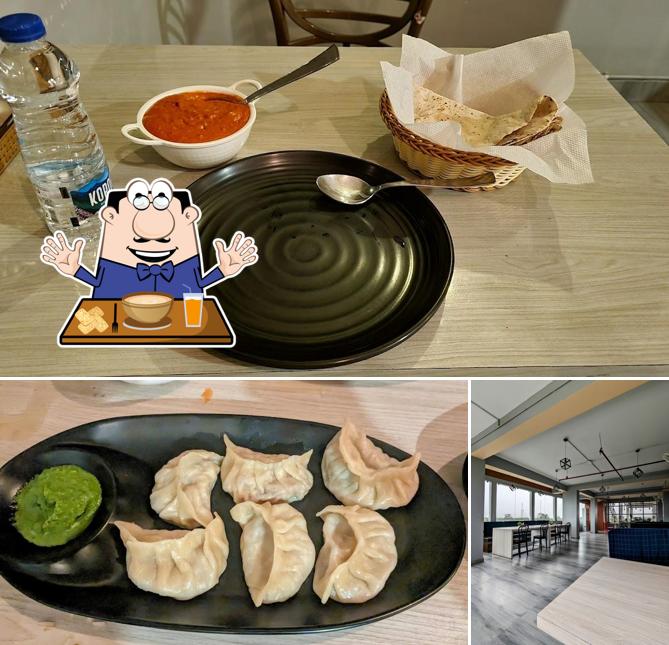 The photo of food and interior at The RoofTop Grill