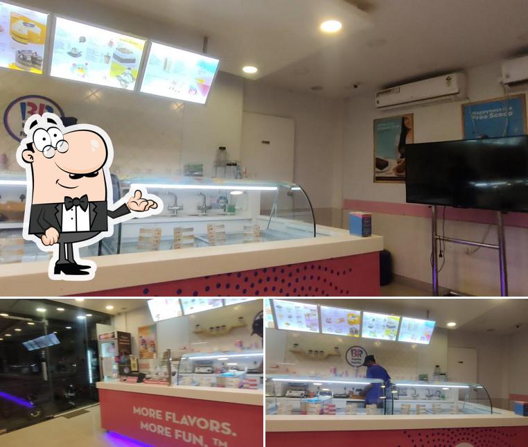 Take a seat at one of the tables at Baskin Robbins