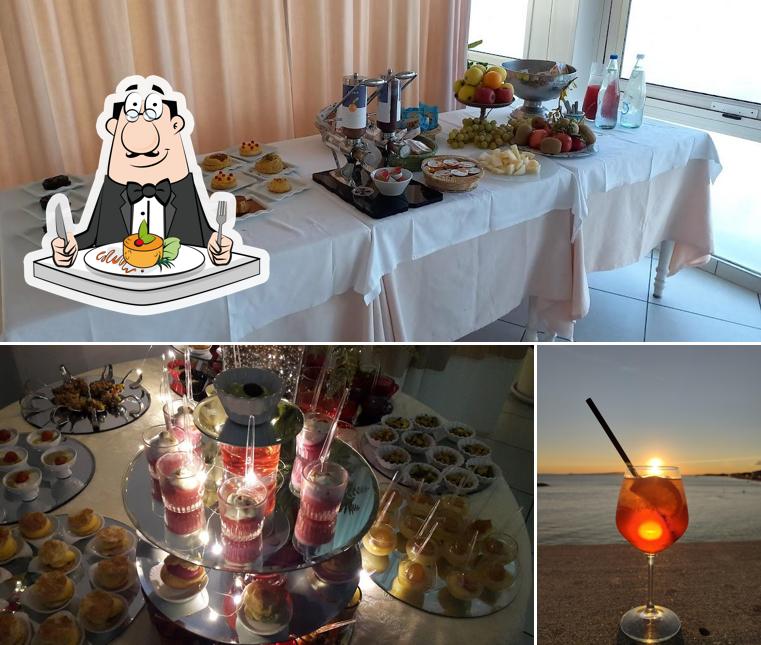 La immagine di cibo e alcol da Hotel Piccolo Mondo