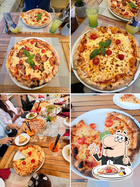 Prenditi una pizza a Tesoro pizzeria