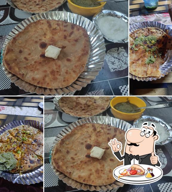 Get pizza at H K Paratha House