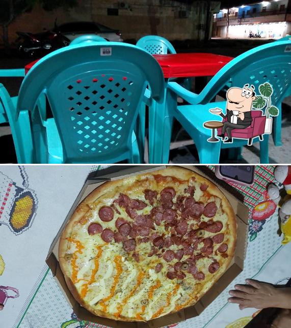Veja imagens do interior do Meu Cantinho Canaã Pizzaria e Esfiharia